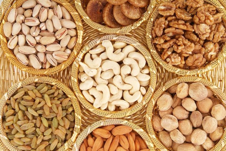 Nuts are often very expensive. It pays to know which ones provide the best bang for buck 
  in terms of nutrient variety and concentration. Nuts are nutritious and pair well with dried fruit in granola, baked items and as a snack food
