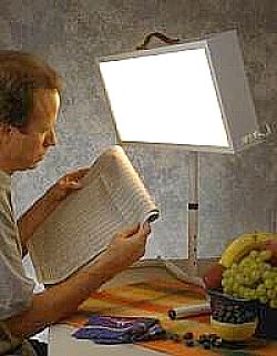 Reading under a bright light can be very effective for resetting your biological clock