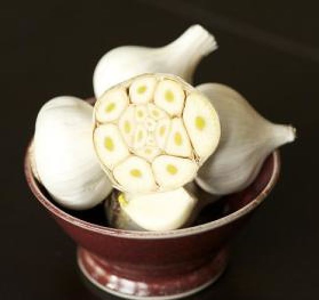 Garlic sliced to reveal its wonderful properties - See teh details in this article